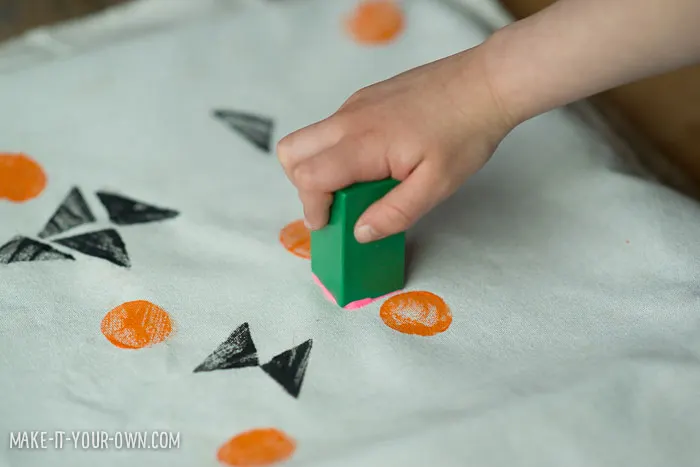 Stamping with Blocks with make-it-your-own.com (Crafts & activities for kids) *This is a great trick to hide stains!