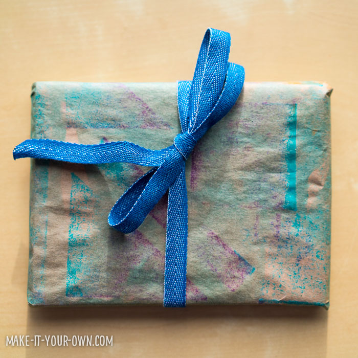 Kid-made wrapping paper (crayon rubbings to create a resist) from make-it-your-own.com (crafts & activities for kids)