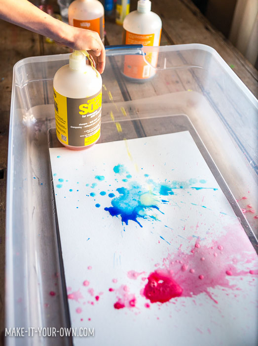 Pump Painting with make-it-your-own.com (Creative activities for kids).  This painting process re-imagines soap pumps as a painting tool.  It allows children to see what secondary colours are formed by the use of primary colours.  (And who doesn't love water play!?)