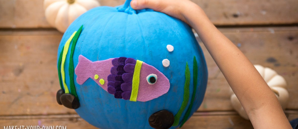 FISHBOWL HALLOWEEN PUMPKIN: Turn a pumpkin into a no-carve jack-o-lantern with a bit of paint, felt or paper and your creativity!