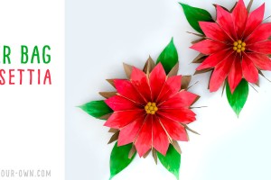 Paper Bag Poinsettias: Make a lunch bag flower with this Christmas craft! These would make an inexpensive decoration for a holiday party! #christmascraft #kidscraft #poinsettiacraft #holidaycraft #paperbagflower #paperbagcraft #craft #holidaydecoration #christmasdecoration