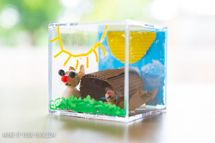 3D Diorama:  Use a baseball cube to explore background, foreground and middle ground to create a multi-layered diorama!  This unique art or craft project could be used with science or social studies and could work for various themes!  #diorama #craft #art #craftforkids #artforkids #backgroundforegroundmidddleground #displayproject 