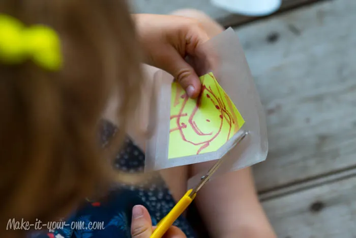 Kid Artwork Mobile: Cutting contact paper from make-it-your-own.com