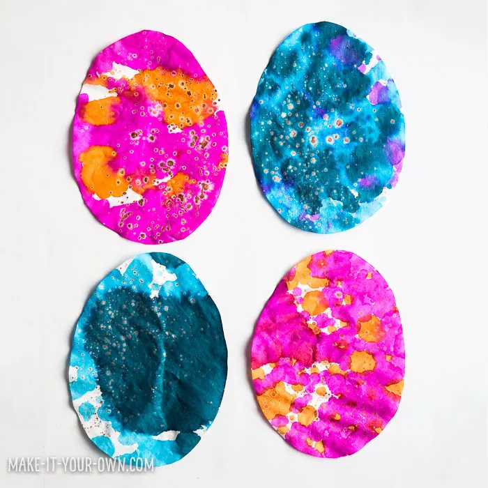 Children in Preschool, Kindergarten and School age will enjoy this painting activity which incorporates pipette painting and splatter painting to make an EASTER EGG GARLAND that would make a beautiful sun catcher!